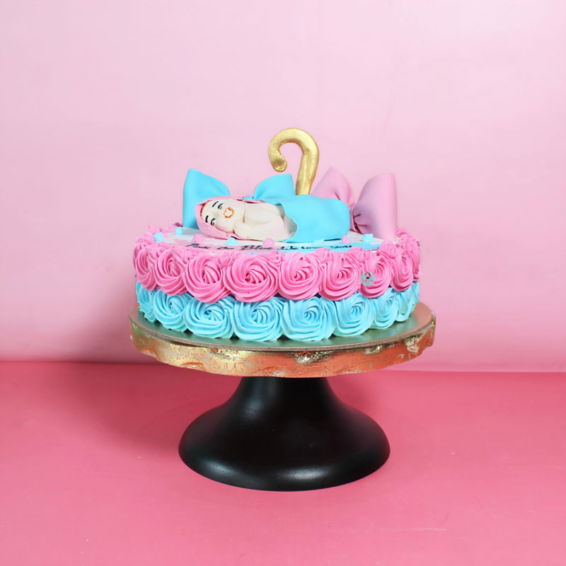 Sprinkles - I love making baby shower cakes! This pretty in pink cake is  complete with sparkling baby booties, a soft quilted pattern design and  shimmering pearls to add the finishing touch! |